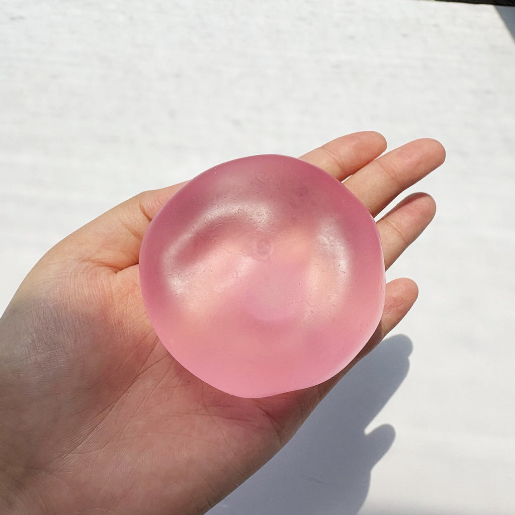 Popular coconut oil squeezeable toy ball, translucent and made of Vaseline, perfect for stress relief. It's malleable, doesn't bounce back, and has a great squishy feel.